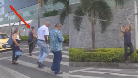 Un gruppo di persone attraversa la strada ma quello che fa questo ragazzo è incredibile