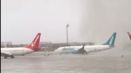 Un violento tornado si abbatte sull'aeroporto: con la sua forza sposta gli aerei in pista