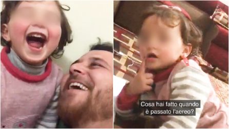 Un gioco per ridere della guerra: la storia del papà che sfida la paura per proteggere sua figlia